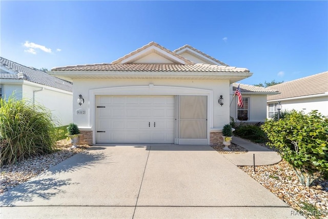 902 W Silver Meadow Loop, Hernando, FL 34442 - ranch-style house featuring driveway, a garage, stucco siding, a tile roof, and stone siding