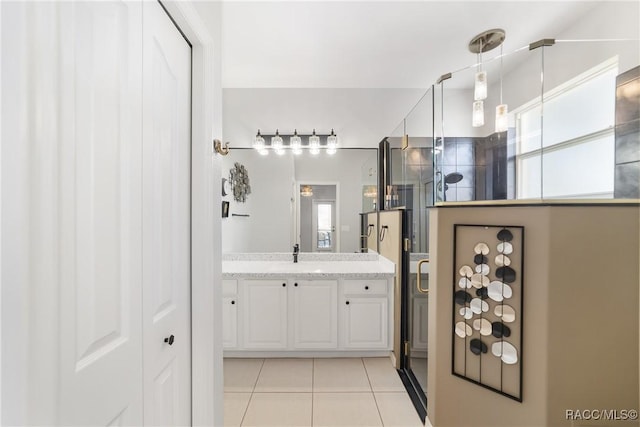 902 W Silver Meadow Loop, Hernando, FL 34442 - bathroom featuring tile patterned floors, a stall shower, and vanity