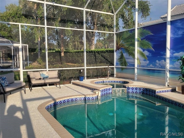 902 W Silver Meadow Loop, Hernando, FL 34442 - view of swimming pool featuring glass enclosure, a patio, and a pool with connected hot tub