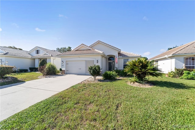 view of front of home with a garage and a front lawn