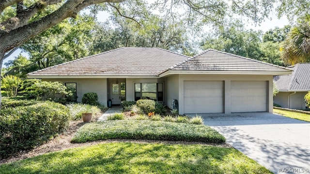 ranch-style house with a garage