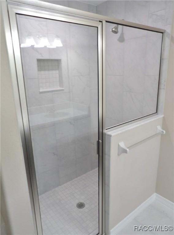 bathroom featuring walk in shower