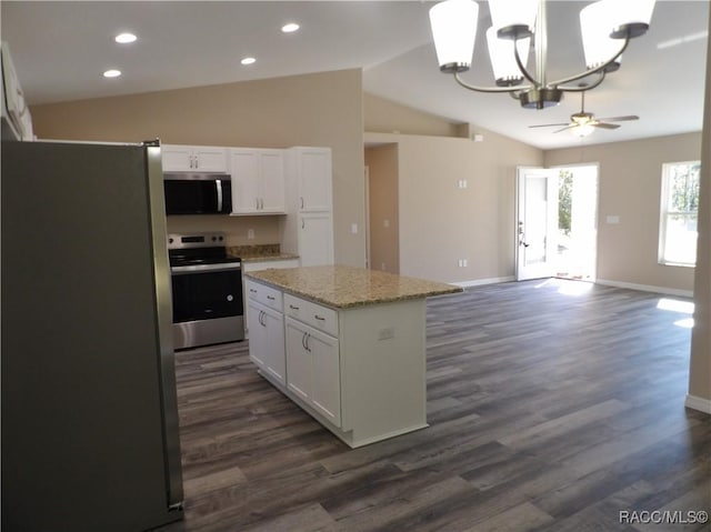 kitchen with white cabinetry, a center island, stainless steel appliances, dark hardwood / wood-style flooring, and lofted ceiling