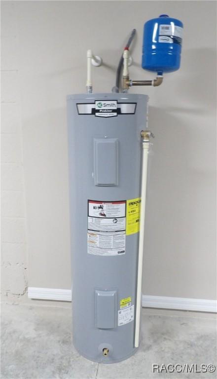 utility room with water heater