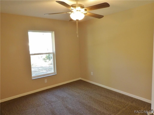 unfurnished room with carpet and ceiling fan