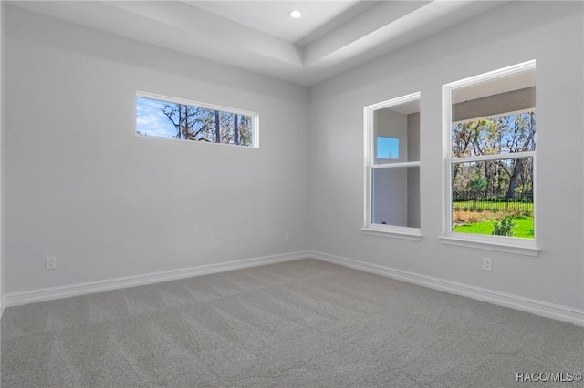 spare room with carpet, baseboards, and recessed lighting