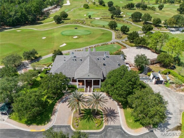 birds eye view of property featuring golf course view