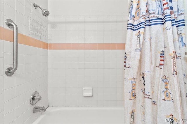 bathroom with shower / bath combo