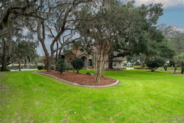 view of yard with a water view