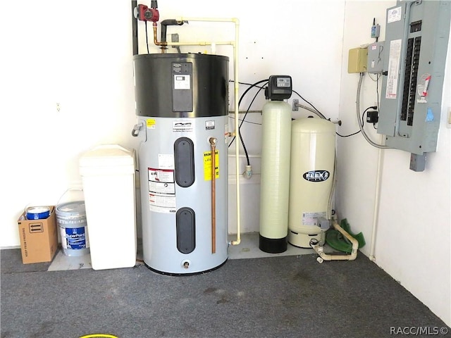 utility room featuring hybrid water heater and electric panel