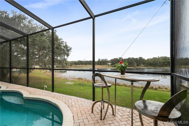 sunroom with a water view