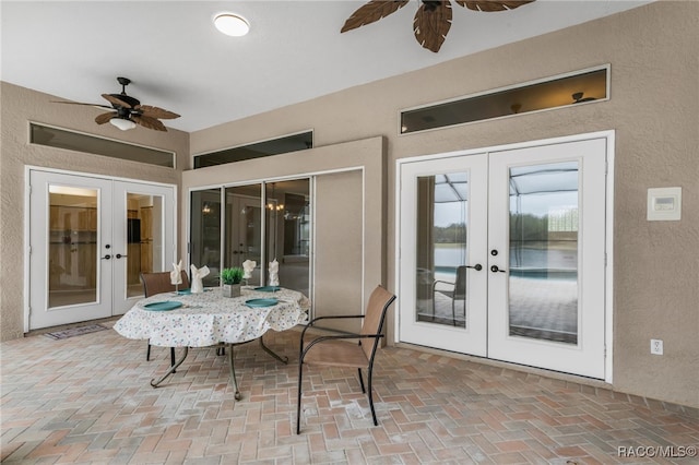 exterior space with french doors and ceiling fan