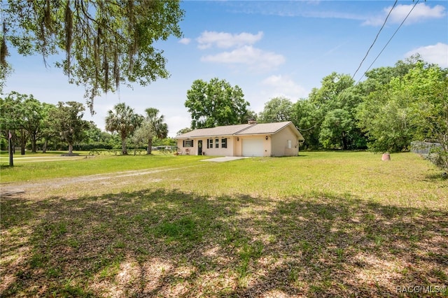 view of yard with an attached garage