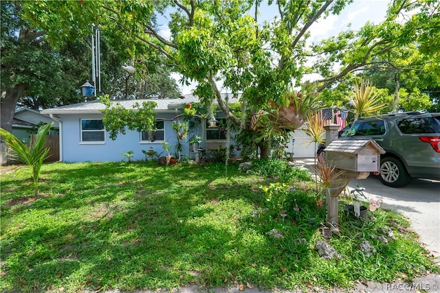 view of yard featuring a garage