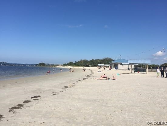 view of water feature with a beach view