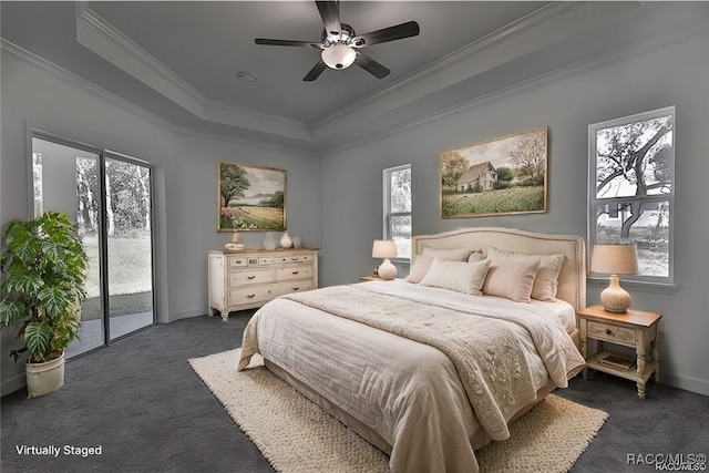 carpeted bedroom featuring ceiling fan, access to exterior, ornamental molding, and multiple windows