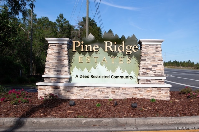 view of community sign