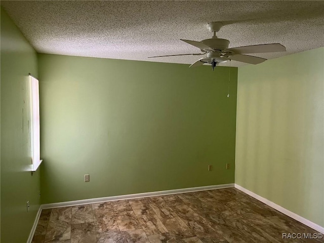 717 Whispering Pines Blvd, Inverness, FL 34453 - empty room with a ceiling fan and a textured ceiling