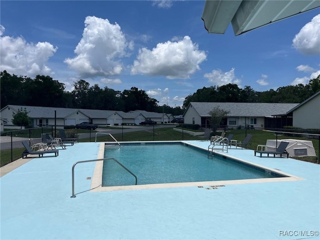 717 Whispering Pines Blvd, Inverness, FL 34453 - community pool featuring a patio