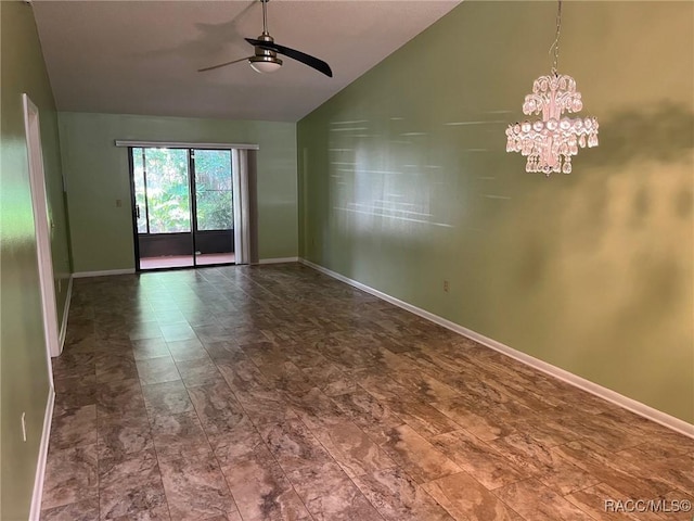 717 Whispering Pines Blvd, Inverness, FL 34453 - empty room featuring vaulted ceiling, a ceiling fan, and a chandelier