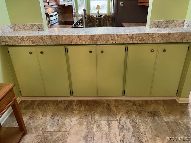 717 Whispering Pines Blvd, Inverness, FL 34453 - kitchen with light countertops and appliances with stainless steel finishes