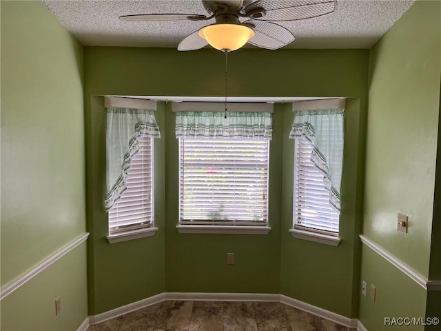 717 Whispering Pines Blvd, Inverness, FL 34453 - spare room featuring ceiling fan and a textured ceiling