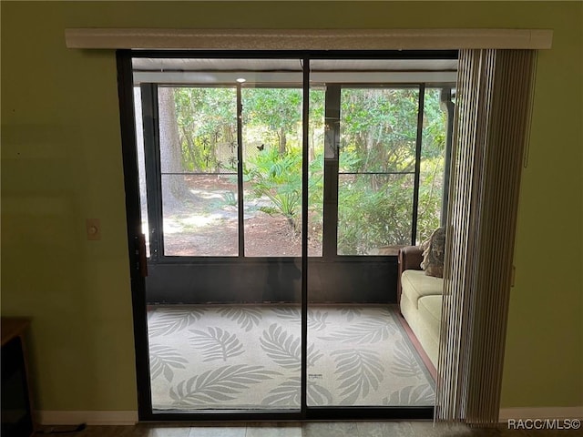 717 Whispering Pines Blvd, Inverness, FL 34453 - doorway to outside with healthy amount of natural light