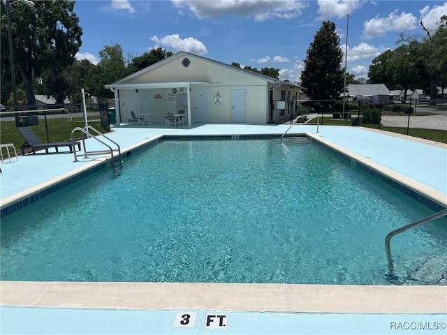 717 Whispering Pines Blvd, Inverness, FL 34453 - community pool featuring a patio area