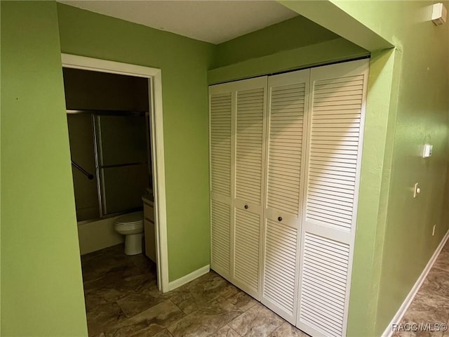 717 Whispering Pines Blvd, Inverness, FL 34453 - bathroom with a closet and bath / shower combo with glass door