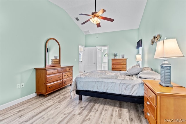 bedroom with ceiling fan, light hardwood / wood-style flooring, and high vaulted ceiling