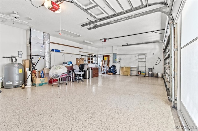 garage featuring electric panel, water heater, ceiling fan, and a garage door opener