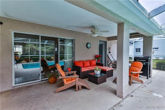 view of patio featuring outdoor lounge area, ceiling fan, and grilling area