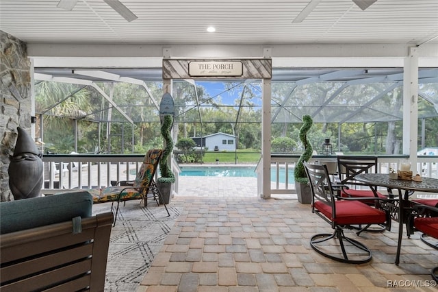 sunroom / solarium with a healthy amount of sunlight