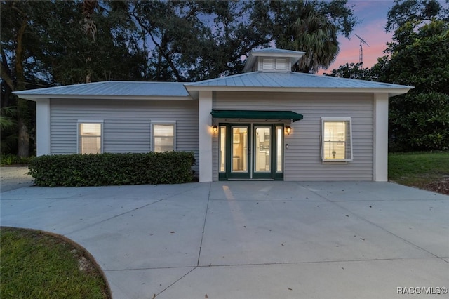 view of front of home with metal roof