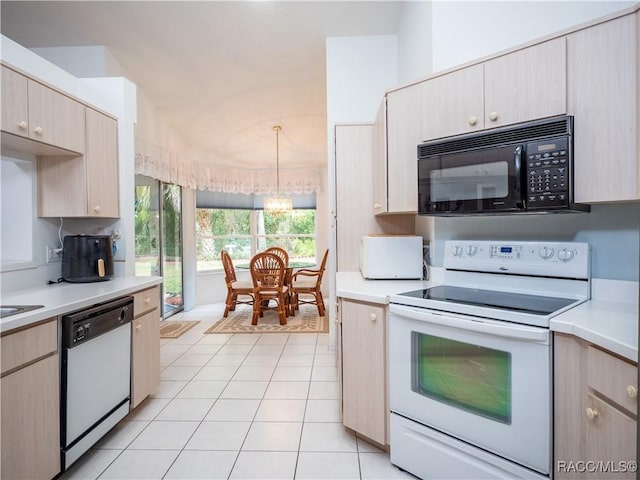 kitchen featuring a notable chandelier, white appliances, light tile patterned flooring, decorative light fixtures, and light brown cabinets