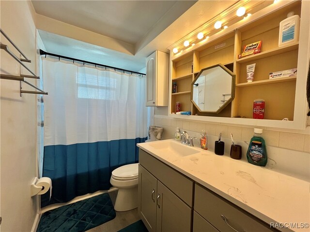 full bathroom with backsplash, vanity, wood-type flooring, shower / bathtub combination with curtain, and toilet