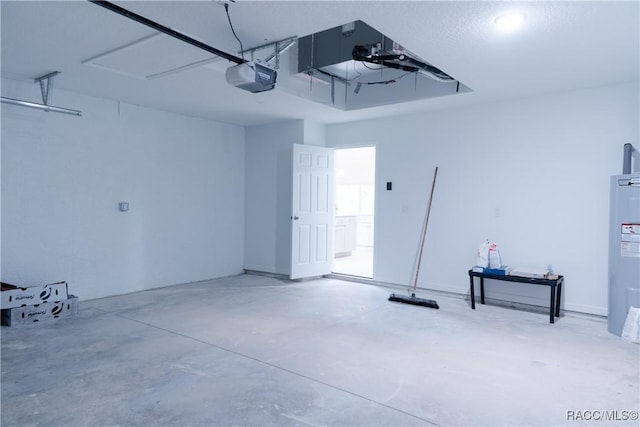 97 W Camino Ln, Citrus Springs, FL 34434 - garage with a garage door opener and water heater