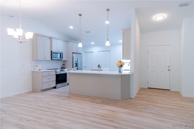 97 W Camino Ln, Citrus Springs, FL 34434 - kitchen with light countertops, stainless steel appliances, and light wood-style flooring