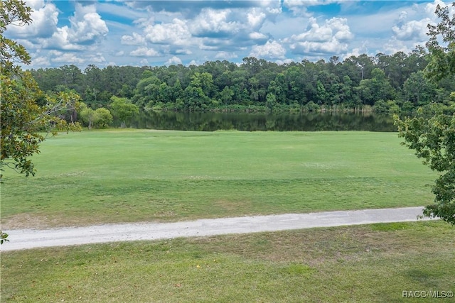688 Midway Dr Unit B, Ocala, FL 34472 - view of property's community featuring view of golf course and a yard