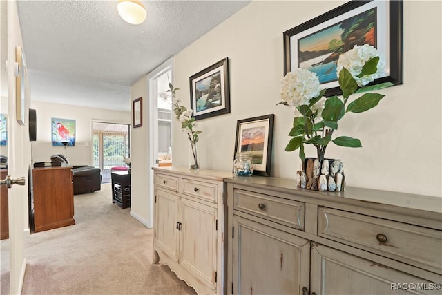 688 Midway Dr Unit B, Ocala, FL 34472 - corridor featuring light colored carpet and a textured ceiling