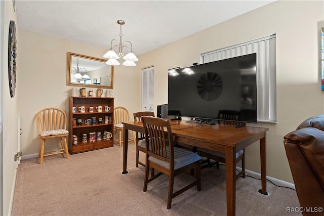 688 Midway Dr Unit B, Ocala, FL 34472 - office area with a chandelier, light colored carpet, and baseboards