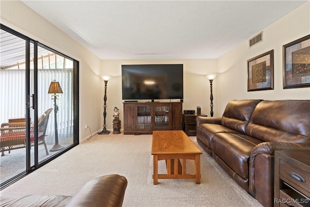 688 Midway Dr Unit B, Ocala, FL 34472 - living room with light carpet and baseboards