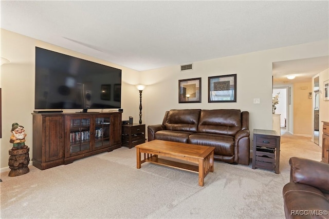 688 Midway Dr Unit B, Ocala, FL 34472 - living room with light colored carpet and baseboards