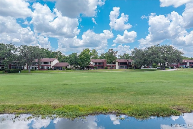 688 Midway Dr Unit B, Ocala, FL 34472 - surrounding community featuring a lawn and view of golf course