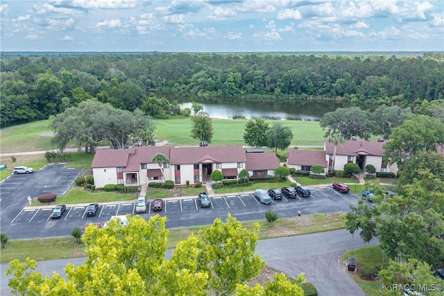 688 Midway Dr Unit B, Ocala, FL 34472 - drone / aerial view of a nearby body of water and a heavily wooded area