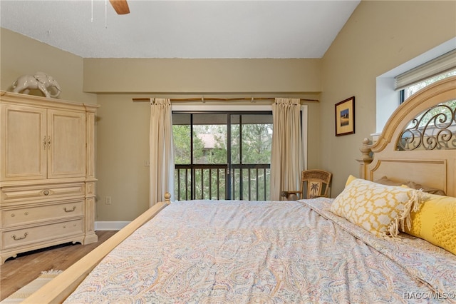 5155 S Gray Pelican Way, Homosassa, FL 34448 - bedroom featuring access to outside, wood finished floors, multiple windows, and a ceiling fan