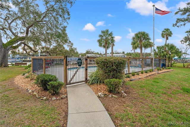 5155 S Gray Pelican Way, Homosassa, FL 34448 - surrounding community featuring a swimming pool and a gate