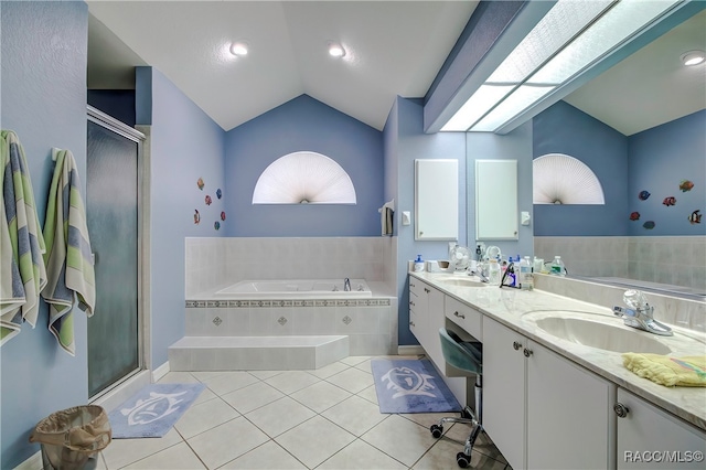 bathroom featuring vanity, shower with separate bathtub, tile patterned flooring, and lofted ceiling