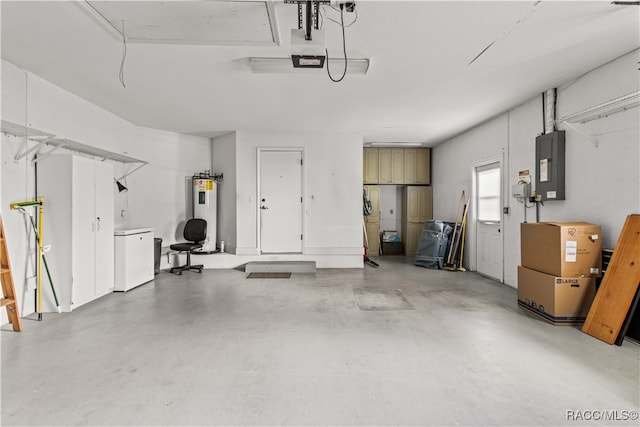 garage featuring electric panel, water heater, a garage door opener, and white refrigerator