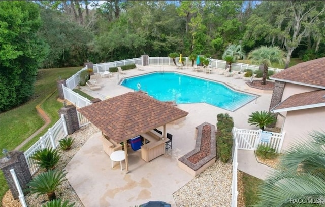 view of swimming pool with a gazebo and a patio